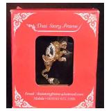 LL-TR - Holiday and Decorative Collectibles Lot: Framed Elephant, Sleigh, Candle, Snowman Ornament, Glass Angel