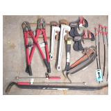 G - Hand Tool Lot with Pipe Wrenches, Bolt Cutters, Clamps, Pry Bars, and Drain Clog Tools