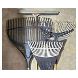 G - Garden Tool Lot with Rakes Watering Cans Solar Flamingo and Hummingbird Feeder