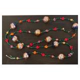 S - Glass Garland with Hand-Painted Faces and Colorful Beads