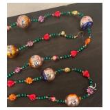 S - Glass Garland with Hand-Painted Faces and Colorful Beads
