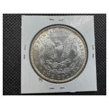 1885 Morgan Silver Dollar Marked MS64 When Purchased
