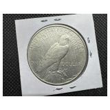 1922-D Peace Silver Dollar Marked AU When Purchased