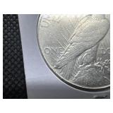 1922-D Peace Silver Dollar Marked AU When Purchased