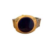 Vintage Digital Watch with Gold-Tone Bezel and Stainless Steel Back