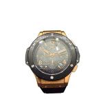 Megir Chronograph Wristwatch with Black Silicone Band and Gold-Tone Case