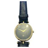 Gucci Swiss Made Black and Gold Wristwatch with Leather Band