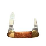 Vintage Two-Blade Pocket Knife with Wooden Handle and Brass Bolsters