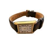 Cartier Tank Watch with Gold-Tone Case and Black Leather Band