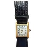 Cartier Tank Watch with Gold-Tone Case and Black Leather Band