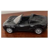 MB - Collection of 4 Diecast Model Vehicles - Corgi and Welly London Buses, Red SUV and Black Sports Car