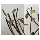 LL  - Metal Sculpture of Child on Swing Under Tree