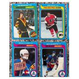 K - Collection of Vintage Hockey Sports Cards Featuring Multiple NHL Teams