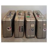 LLS - Set of 4 Vintage Aluminum Suitcases with Travel Stickers