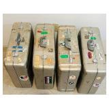 LLS - Set of 4 Vintage Aluminum Suitcases with Travel Stickers