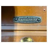 Vintage Samsonite Suitcase with Travel Stickers and Assorted Clothing