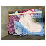 Vintage Samsonite Suitcase with Travel Stickers and Assorted Clothing