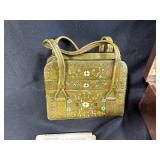 Vintage Clothing and Accessories Collection with Leather Suitcase and Handbag