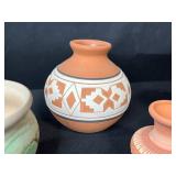 Southwestern Pottery and Folk Art Collection with Decorative Drum and Carved Box