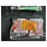 Large Assortment of Beads and Thread with Storage Bin
