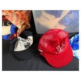 Collection of Tote Bags and Mesh Caps in Storage Bin