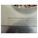 Holiday Decor Collection with Dept 56 Santabear Village Mistletoe Wedding Chapel, Table Linens, and Crochet Doilies