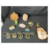 Collection of Vintage Curiosities Including Pottery Canteen, Figurines, Coasters, and Decorative Items