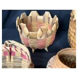 Collection of Handwoven Baskets and Decorative Trays