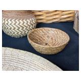 Collection of Handwoven Baskets and Decorative Trays