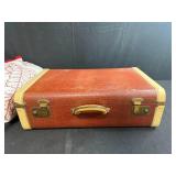 Vintage Brown Suitcase with Red and White Handmade Quilt
