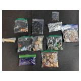 Collection of Tumbled and Polished Stones, Gemstones, and Mineral Specimens in Bags