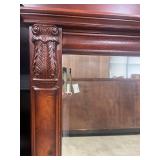Broyhill Ornate Wood-Framed Wall Mirror with Decorative Crest