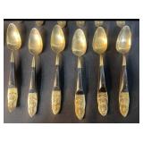 Siam 24-Piece Black and Brass Flatware Set with Embossed Handles