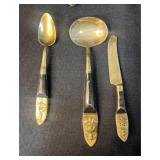 Siam 24-Piece Black and Brass Flatware Set with Embossed Handles