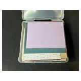 Assorted Scrapbook Paper Collection in Plastic Storage Case