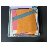 Assorted Scrapbook Paper Collection in Plastic Storage Case