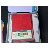 Assorted Scrapbook Paper Collection in Plastic Storage Case