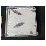 Assorted Scrapbook Paper Collection in Plastic Storage Case