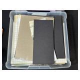 Assorted Scrapbook Paper Collection in Plastic Storage Case
