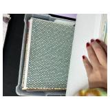 Assorted Scrapbook Paper Collection in Plastic Storage Case