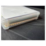 Assorted Scrapbook Paper Collection in Plastic Storage Case