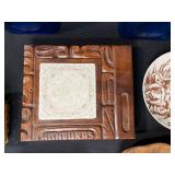 Eclectic Decorative Collection with Blue Glass Bottles, Plates, Wood Dish, and Longaberger Basket
