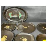 Collection of Vintage Metal Trays and Plates with Artistic Designs