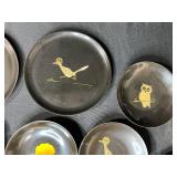 Collection of Vintage Metal Trays and Plates with Artistic Designs