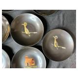 Collection of Vintage Metal Trays and Plates with Artistic Designs