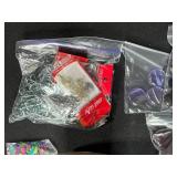 Collection of Jewelry Making Supplies with Cords, Beads, Clasps, and Findings