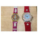 Set of 2 Swatch Watches including Lady Red Swatch and ROI Soleil