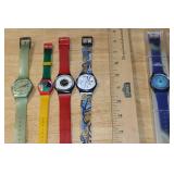 Collection of 5 Swatch Watches Including Space Dreams and Club Watch 99