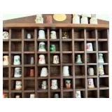 Fun Thimble Collection in a Wooden Cabinet