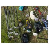 Golf Clubs in A Golf Bag, Ice Bucket, Etc.